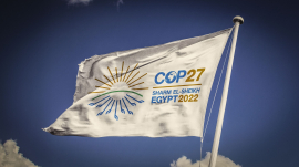 In this photo illustration The 2022 United Nations Climate Change Conference COP27 logo seen on a flag. Event will be on 7-18 November 2022, in Sharm El-Sheikh, Egypt The 2022 United Nations Climate Change Conference COP27 event will take place from the 7-18 November 2022, in Sharm El-Sheikh, Egypt. (Photo by Rafael Henrique / SOPA Images/Sipa USA)(Sipa via AP Images)